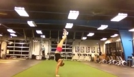 Handstand pirouettes with shoulder touches